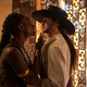 Queen Njinga and a white man having an argument